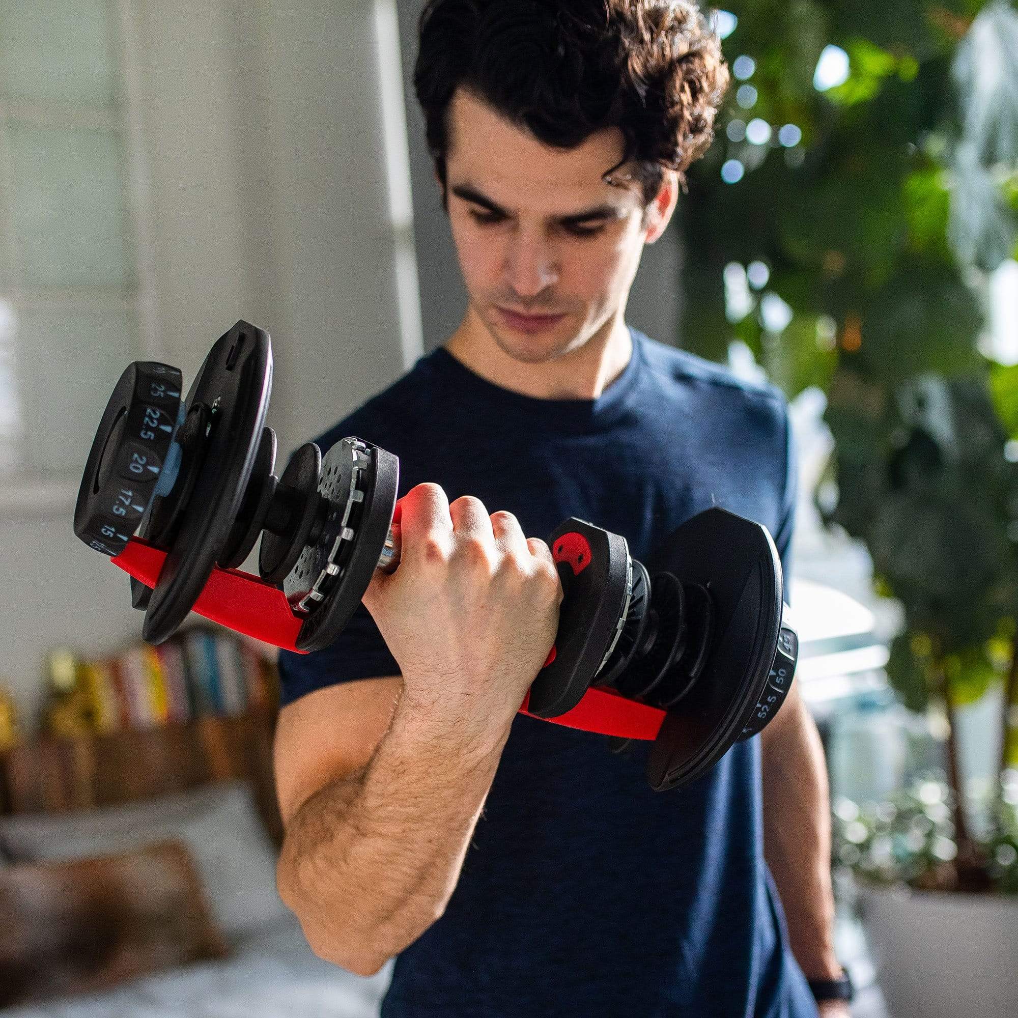 using adjustable dumbbells